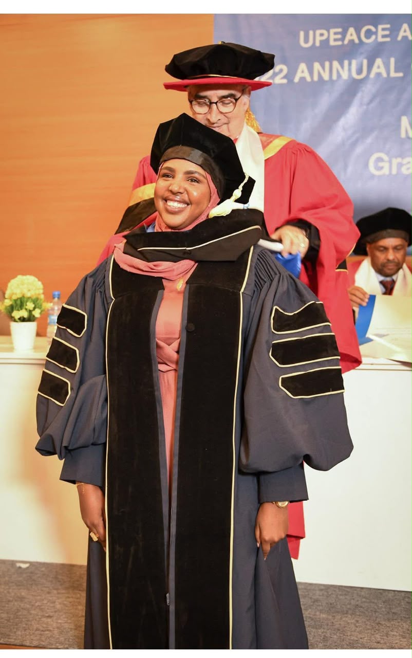 A UPEACE graduate receiving her degree at the commencement ceremony